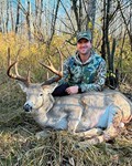 The author with his archery whitetail.