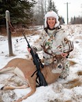 Karin posing with her whitetail buck.